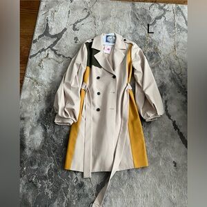 Women’s color block trench coat.